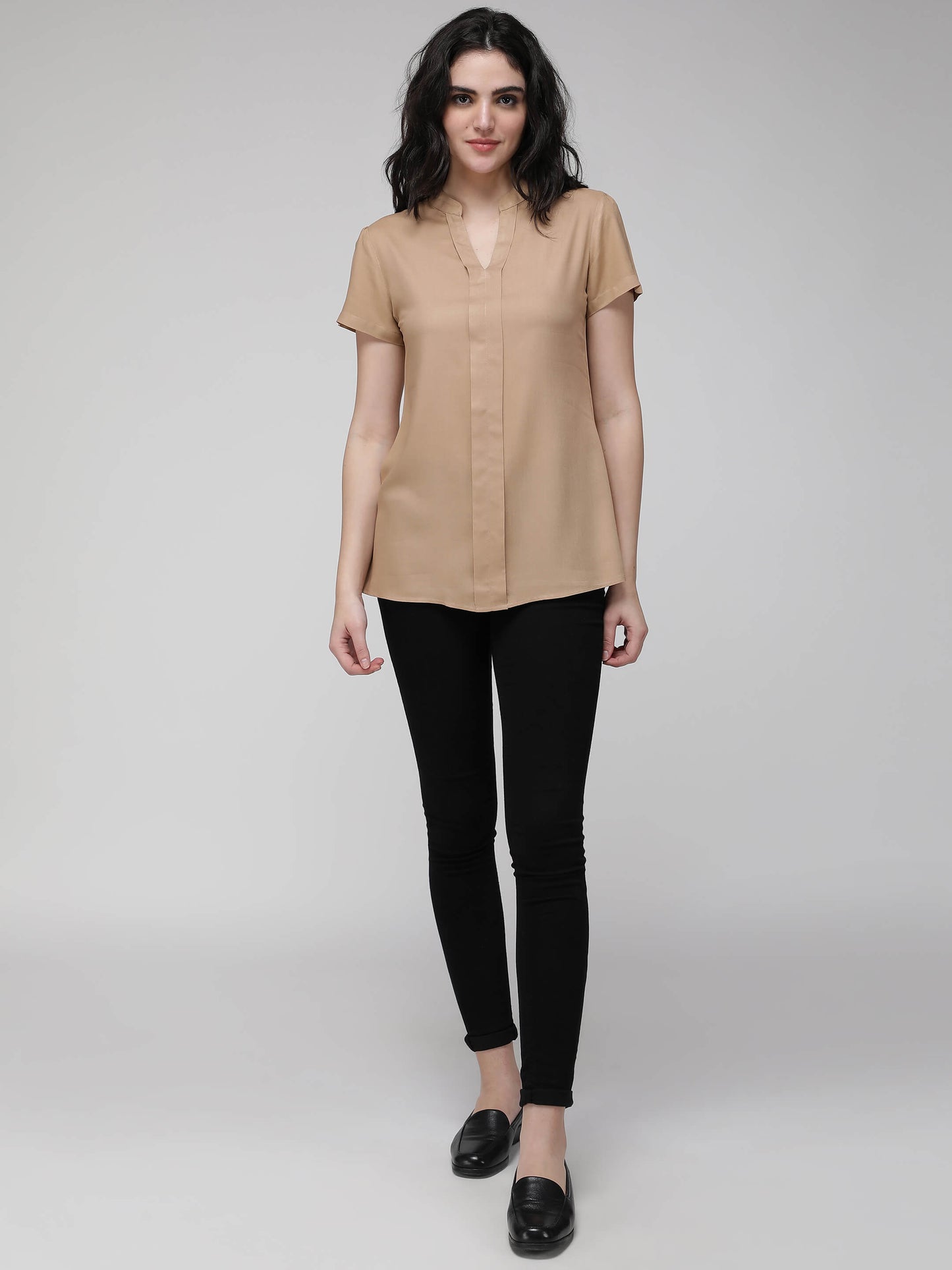beige top
