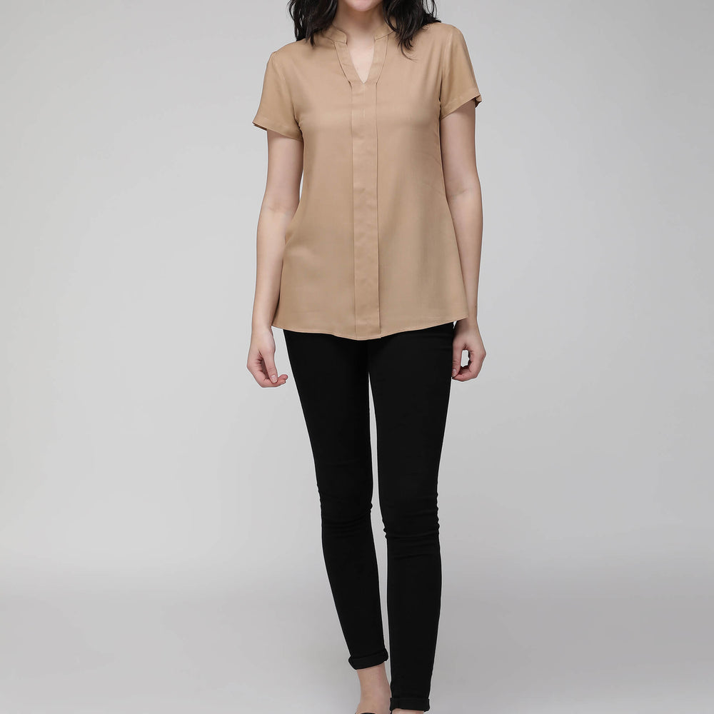 beige top 